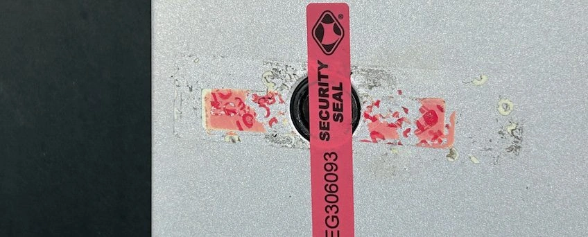 A security seal on a gas pump.